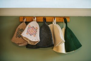 Traditional felt sauna hats hanging in a Nooth-built sauna, Cornwall
